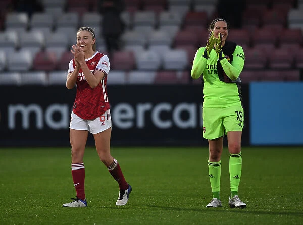 Arsenal Women's FA WSL Triumph: Leah Williamson and Lydia Williams Celebrate with Fans