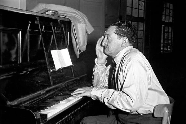 Song writer Harry Leon seen here playing piano. May 1953 D2367-004
