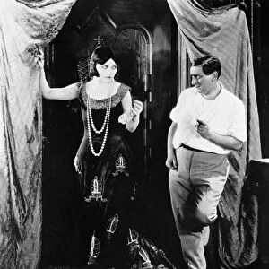 NEGRI AND LUBITSCH. Actress Pola Negri (1897-1987) and director Ernst Lubitsch (1892-1947) rehearsing for a scene of the silent movie Forbidden Paradise, 1924