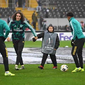 Arsenal Players Engage in Pre-Match Playtime with Ballboy Before Vitoria Guimaraes Clash