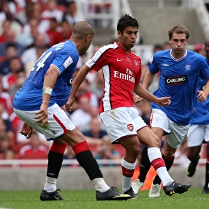 Eduardo (Arsenal) Madjid Bougherra and Kevin Thomson (Rangers)