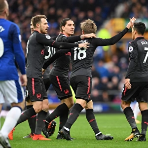 Monreal, Bellerin, and Ramsey Celebrate Arsenal's First Goal Against Everton (2017-18)