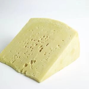 Slice of Greek Kefalotyri DOC ewe, and ewe and goats milk cheese