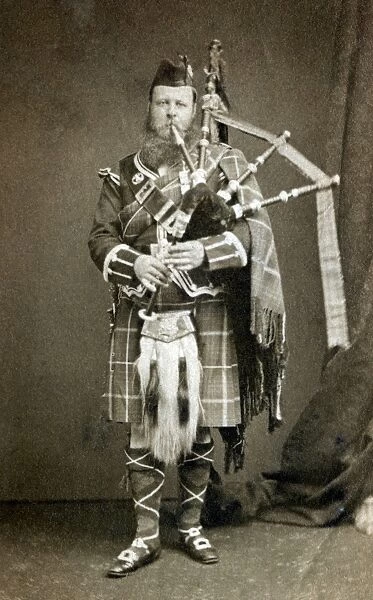 Scotsman playing the Bagpipes