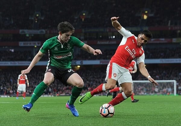 Arsenal's Alexis Sanchez vs. Lincoln City's Alex Woodyard: A FA Cup Quarter-Final Battle