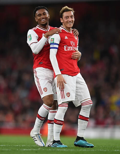 Arsenal's Ozil and Nelson in Action against Nottingham Forest in Carabao Cup Third Round