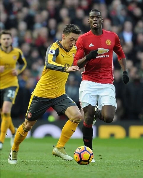Mesut Ozil Outsmarts Pogba: A Premier League Battle - Arsenal vs. Manchester United (2016-17)