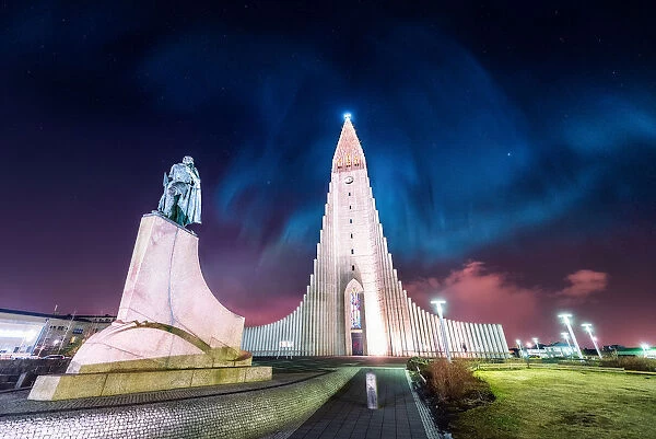 aurora borealis display over famous Hallgrimskirkja church, reykjavik, Iceland