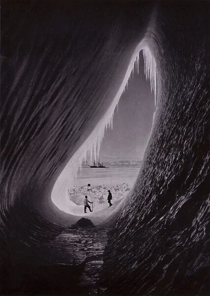 Grotto in an iceberg; Terra Nova in the distance (b  /  w photo)