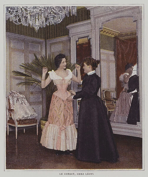 Woman trying on a corset at Leoty, Paris (colour photo)