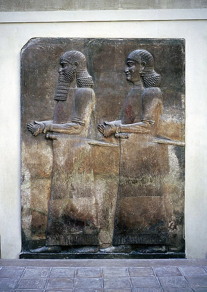 Assyrian relief of two servants, Palace of Sargon II, Khorsabad, c8th century BC