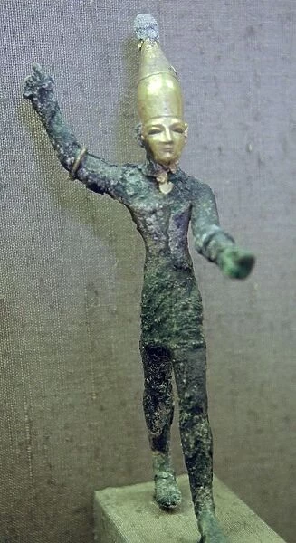 Gold and bronze statuette of Baal hurling a thunderbolt