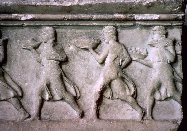 Greek relief of servants carrying food