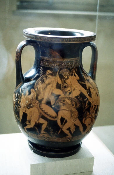 Greek vase decorated with figures of warriors fighting