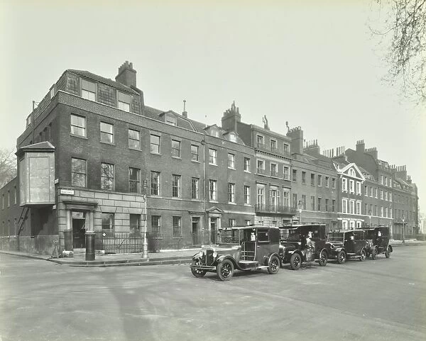 Line of taxis, Abingdon Street, Westminster, London, 1933