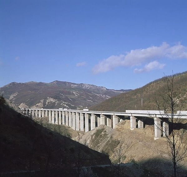 A new motorway being built, cutting through the Apennines