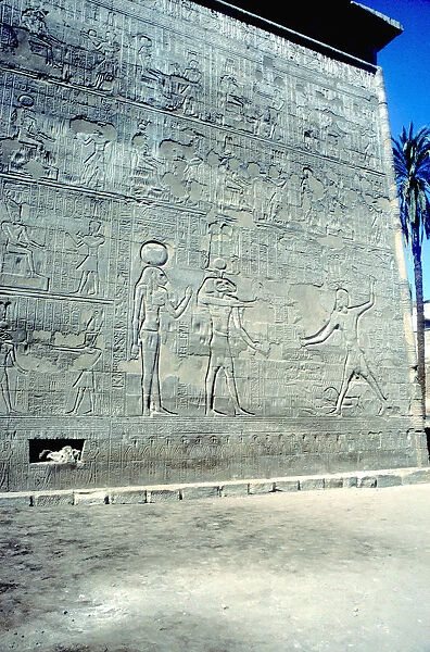 Reliefs of Pharaoh smiting enemies, The first Pylon, Temple of Khnum, Esna, Egypt
