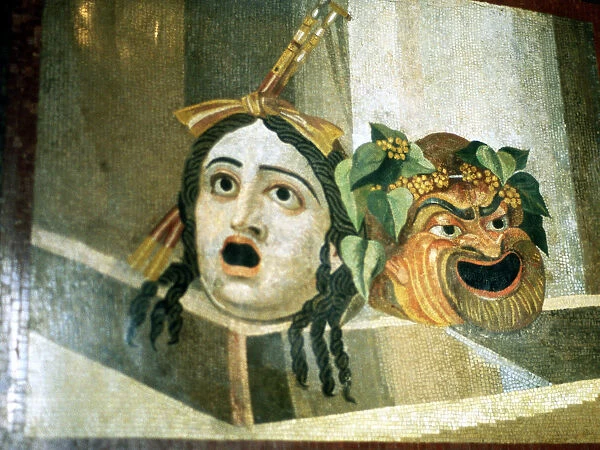 Theatrical masks of tragedy and comedy depicted in a Roman mosaic