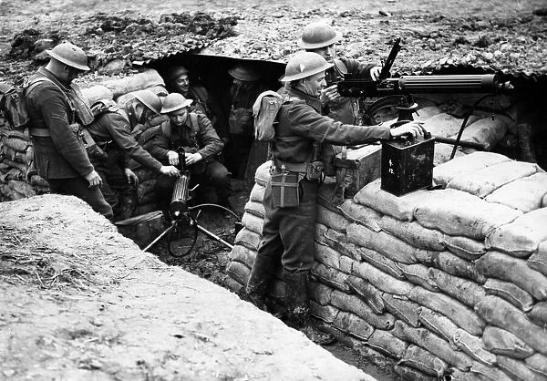 A battalion of the Middlesex Regiment in a dugout with a machine gun post