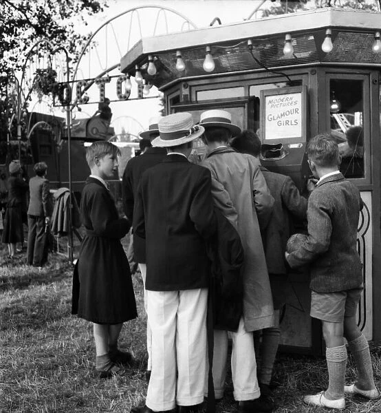 Boys at Henley queue to look at 'what the butler saw machine'. July 1953 D3393