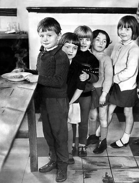 School children at Laygate Lane Junior Mixed School, South Shields line up for lunch