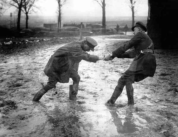 World War One. A British officer helps a fellow officer who