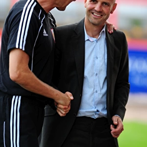 Bristol City Assistant Manager, Keith Millenwith Exeter city Manager Paul Tisdale