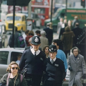 Met Police PC and WPC, urban scene