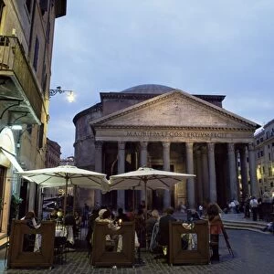 Restaurant and the Pantheon illuminated at dusk