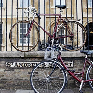 Bicycles attached to railings in Cambridge