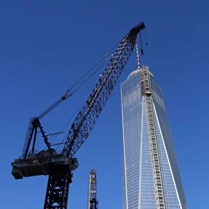 One World Trade Center ( 1 WTC ) building construction with crane, New York. America