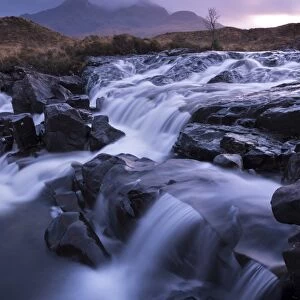 The river Allt Dearg Mor tumbling over a series of waterfalls in Glen Sligachan, Isle of Skye