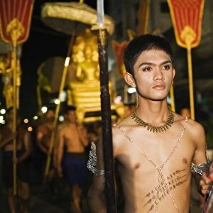 Thailand, Nakhon Ratchasima, Phimai. Parade through the streets of Phimai during the annual Phimai festival. The festival in November celebrates the towns culture and history with dances, boat races and a sound and