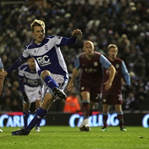 Sebastian Larsson's Penalty Goal: Birmingham City Takes the Lead Against Aston Villa in Carling Cup Quarterfinal (02-12-2010, St. Andrew's)
