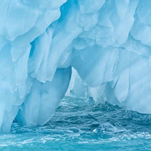 Arctic, Svalbard, Nordaustlandet Island. Colorful bits of ice have calved from the