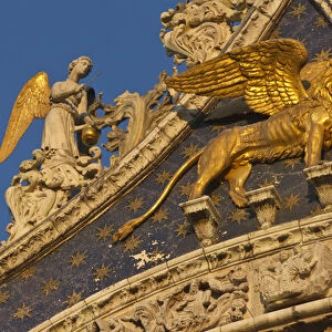 Europe, Italy, Venice. Close-up of Lion of San Marco on facade of San Marco Basilica