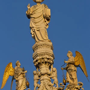 Europe, Italy, Venice. Detail of statue of Christ on facade of San Marco Basilica