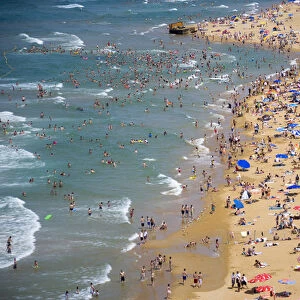 People enjoying the beach and swimming in the sea, aerial, Gumusdere, Black Sea coast of Istanbul