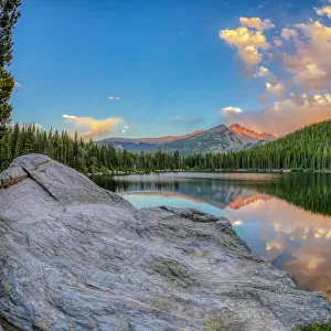 USA, Colorado, Rocky Mountain National Park. Longs Peak reflects in Bear Lake at sunset