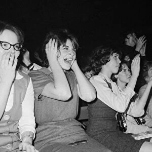 THE BEATLES, 1964. Fans screaming during the Beatles concert at the Washington