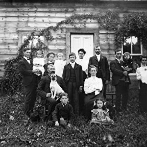 WISCONSIN FAMILY, c1890. A rural Wisconsin family photograhped in front of their home