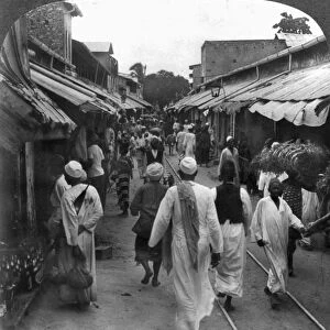 ZANZIBAR: STREET, c1912. Busy street scene in the business section of Zanzibar