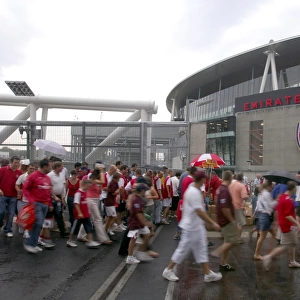 Arsenal fans cross the North Bridge to get to Emirates Stadium