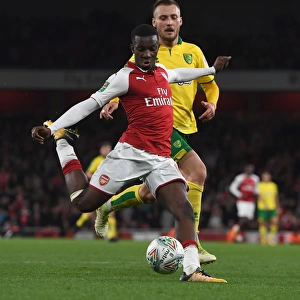Arsenal's Eddie Nketiah Faces Off Against Norwich's Tom Trybull in Carabao Cup Showdown