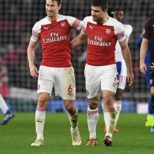 Arsenal's Koscielny and Sokratis Celebrate after Arsenal FC vs Chelsea FC, Premier League 2018-19