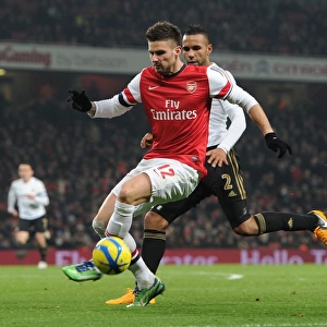 Arsenal's Olivier Giroud Clashes with Swansea's Kyle Bartley in FA Cup Third Round Replay