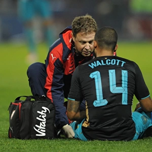 Arsenal's Theo Walcott Receives Treatment During Sheffield Wednesday vs Arsenal - Capital One Cup 2015-16