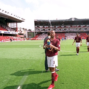 Ashley Cole (Arsenal) squirts water before the match