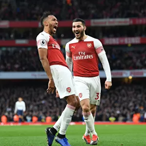 Aubameyang and Kolasinac Celebrate Arsenal's Winning Goal Against Tottenham
