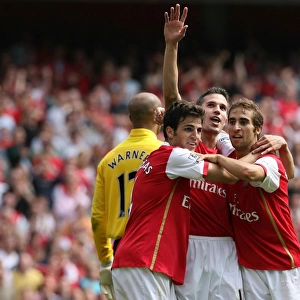 Celebrating the Goal: Van Persie, Fabregas, and Flamini Rejoice as Hleb Scores for Arsenal Against Fulham (2007)